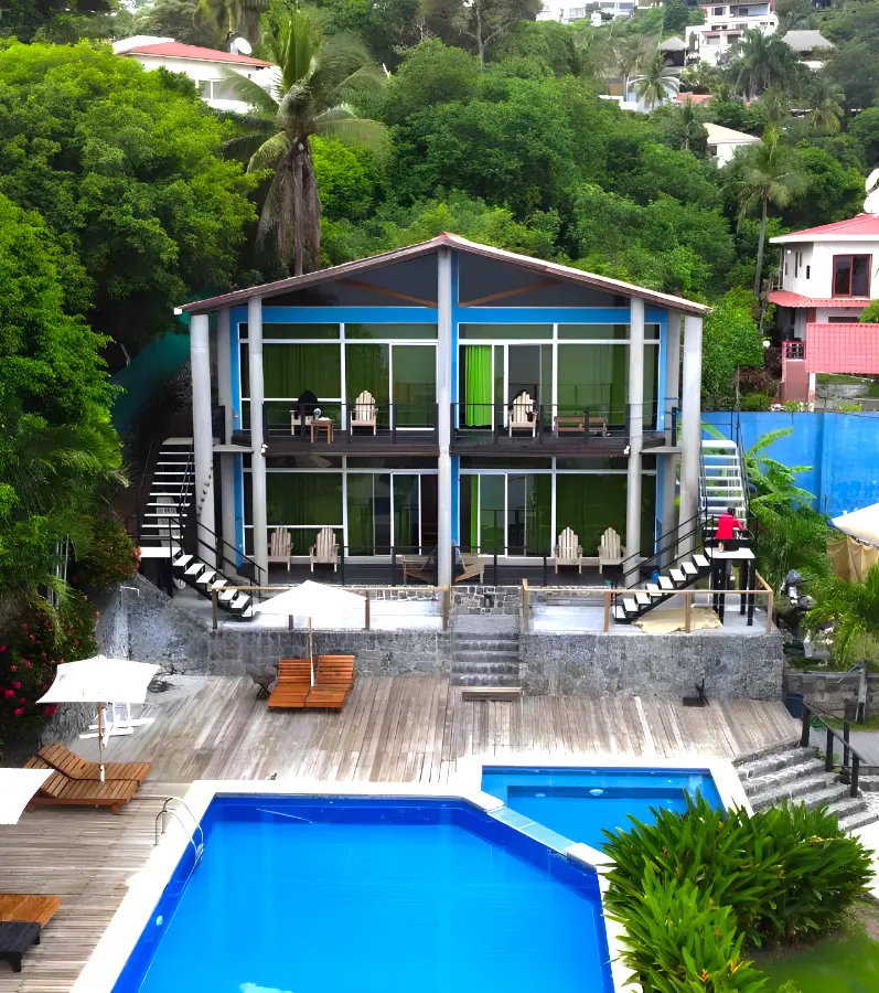 A drone flies over Kayu Resort in 2020